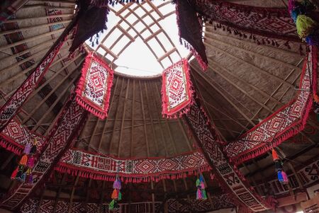 Shanyrak - The wooden crown of the yurt. 
Yurt - portable, bent dwelling structure traditionally used by nomads in the steppes of Central Asia as their home.の写真素材