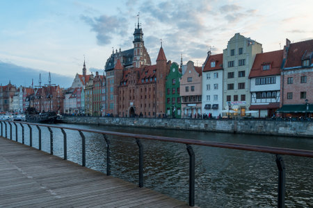 Gdansk, Poland - 05.06.2017: Cityscape of a Baltic sea port viewed from wooden walk by the canal. Traditional colorful houses in Gdansk, Poland.の写真素材