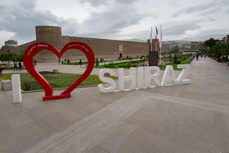 Shiraz, Iran - 04.18.2019: I love Shiraz sign in front of Castle of Karim Khan on a cloudy day.のeditorial素材