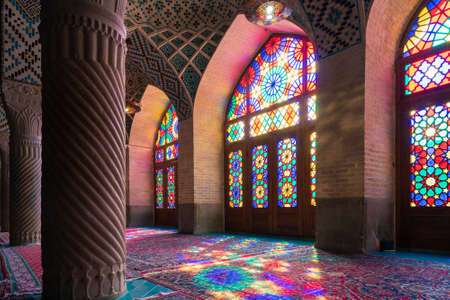 Shiraz,Iran - 04.07.2019: Interior of the Pink Mosque in Shiraz. Islamic ornaments, sun shines through colorful glass and casts color in the interior.のeditorial素材