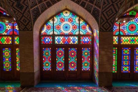 Shiraz,Iran - 04.07.2019: Interior of the Pink Mosque in Shiraz. Islamic ornaments, sun shines through colorful glass and casts color in the interior.のeditorial素材