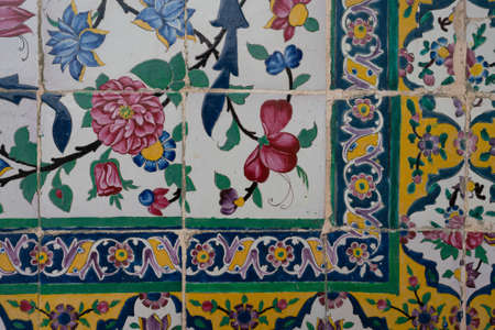 Detail of ceramic tiles with islamic floral ornaments. Floral patterns of Shia islam, Shiraz, Iran.の写真素材