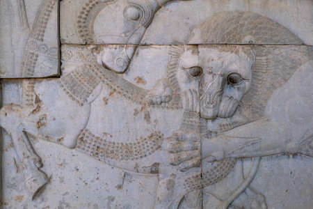 Ruins, statues and murals of ancient persian city of Persepolis in Iran. Most famous remnants of the ancient Persian empire.の写真素材