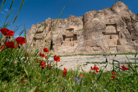 Sandstone rock with carved tombs of persian kings in Necropolis, Iran. King burial site of ancient Persia. Zoroastrian temple.の写真素材