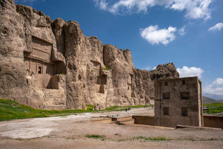 Sandstone rock with carved tombs of persian kings in Necropolis, Iran. King burial site of ancient Persia. Zoroastrian temple.の写真素材