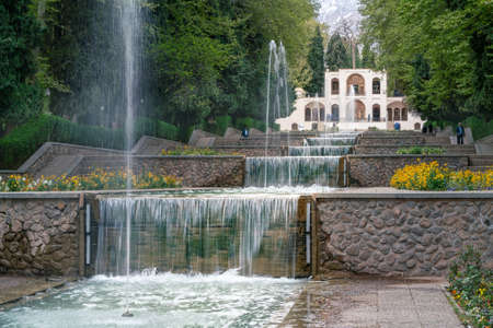 Mahan, Iran - 04.09.2019: Water cascades of Shahzadeh Mahan Historical Garden, Iran. Beautiful persian garden with water flowing through it in waterfalls. Iran, Persia.のeditorial素材