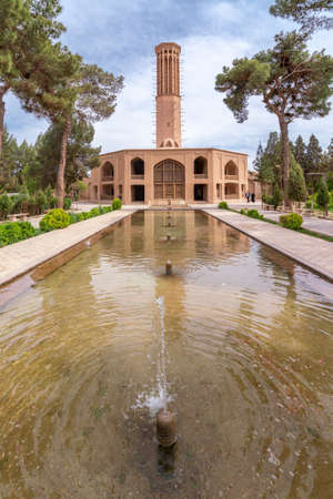 Yazd, Iran - 14.04.2019: The tallest wind tower of Iran in Dolat-Abad Garden, Yazd, Iran. Historical cooling device in beautiful persian garden. Persia.のeditorial素材
