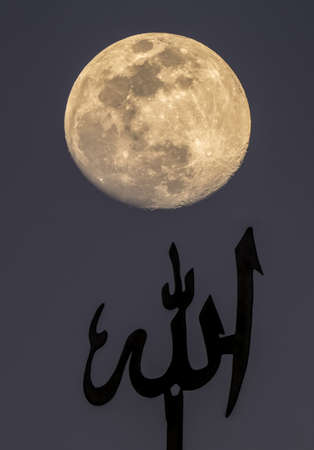 A full moon shining above islamic ornament. Mystical evening in ancient Persia. God, soul and...