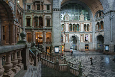 Antwerp, Belgium - 04.29.2018: Inside the old part of Antwerpen-Centraal train station. Old urban industrialarchitecture with lot of symmetries.のeditorial素材