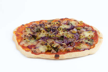 High angle studio shot of freshly baked pizza al tonno isolated on white background. Tuna, olives, onions, veggies, crust, tomato sauce.の写真素材