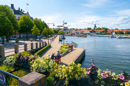 Vastervik, Sweden - 08.22.2021: Cityscape of Vastervik with Church tower on the horizon and city bay in the front. Sunny summer day in southern Sweden.のeditorial素材