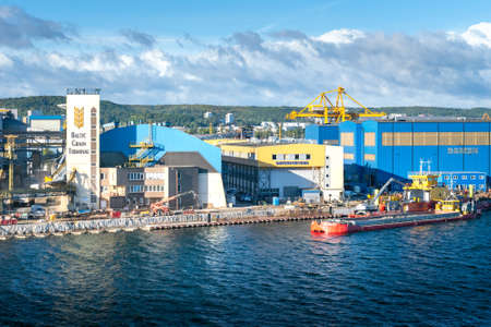 Gdynia, Poland - 09.23.2021: Baltic Grain Terminal and its surroundings on a sunny day, viewed from the deck of cruising ship.のeditorial素材