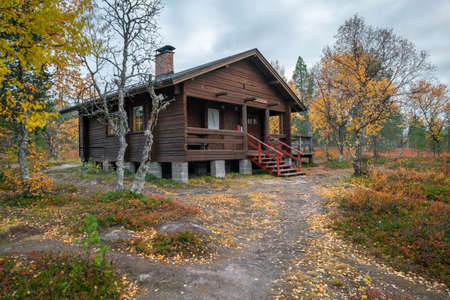 Hetta, Finland - 09.19.2021: Wooden Pyhakero Open Wilderness Hut on the Hetta-Pallas trail in the forest of Pallas-Yllastunturi National Park.のeditorial素材