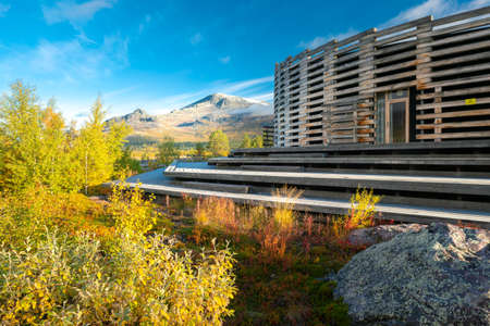 Vietas, Sweeden - 09.16.2021: Modern wooden building of Visitor Center Laponia in Stora Sjofallet, Stuor Muorkke National Park in Swedish Lapland. Beautiful autumn colors in remote arctic landscape.のeditorial素材