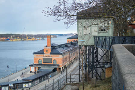 Stockholm, Sweden - 04.15.2017: Red brick building of Fotografiska, museum of photography, close to water canal in Swedish Capital.のeditorial素材