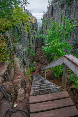 Slattdalsskrevan Canyon in Skuleskogen National Park, Sweden. Narrow crevasse in solid rock on a...
