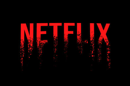 Celadna, Czechia - 04.21.2022: Approximation of Netflix logo dispersing into dust. Concept for shares plummeting, valuation decrease, company crisis. Stock price plunge.のeditorial素材