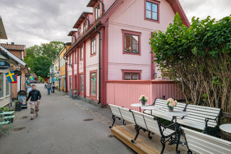 Sigtuna, Sweden - 09.02.2022: Stora Gatan, main historical street of Sigtuna, oldest town in Sweden. Cloudy day of summer.のeditorial素材