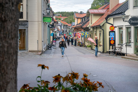 Sigtuna, Sweden - 09.02.2022: Stora Gatan, main historical street of Sigtuna, oldest town in Sweden. Cloudy day of summer.のeditorial素材