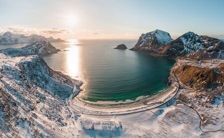 Aerial picture of Haukland beach with amazing light. a small creek in foreground and beautiful mountain next to the beach. located in Lofoten islands, VestvagÃ¸y. North of Norwayの写真素材