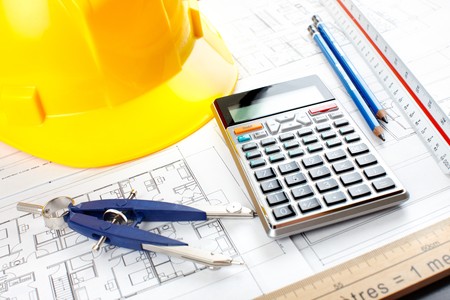 pencil and calculator over a construction drawing
の写真素材