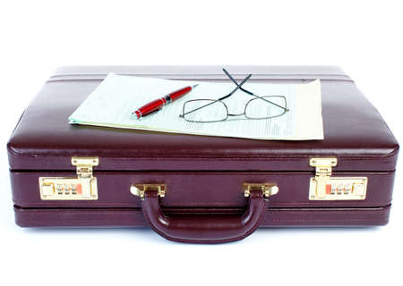 Case and writing-materials on a white backgroundの写真素材