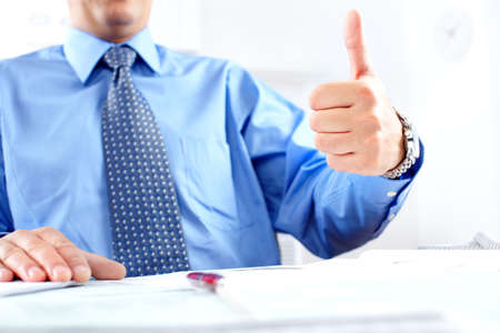 Mature businessman with blue shirt and tieの写真素材