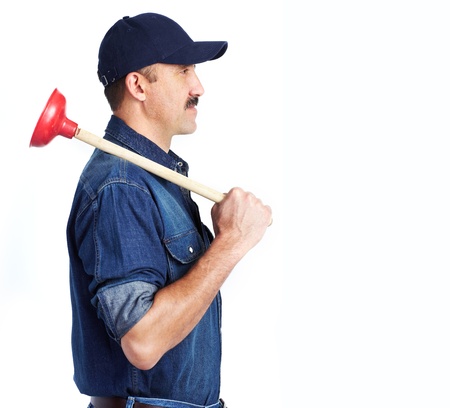 Plumber with a toilet plunger. Isolated over white backgroundの写真素材