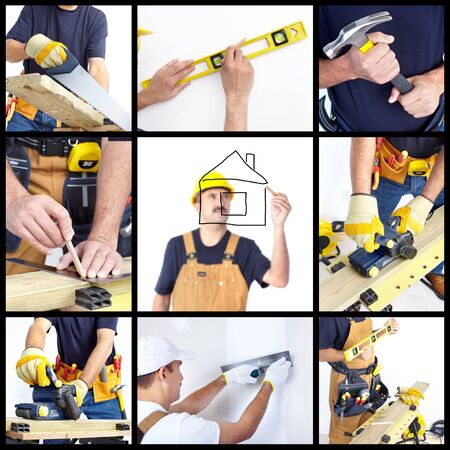 Mature contractor working. Over white background. Workerの写真素材