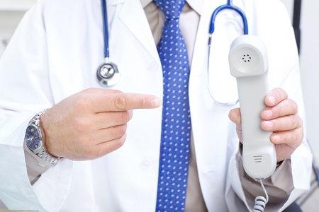 Medical doctor with telephone in the office
の写真素材