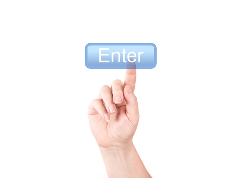 To press the button on a white backgroundの写真素材