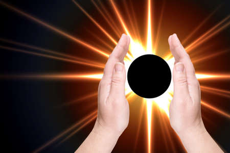 Large solar eclipse on a black backgroundの写真素材