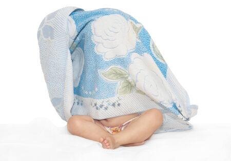 The baby and counterpane on a white background