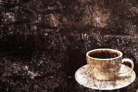Coffee cup on the old brown paper  Grungeの写真素材