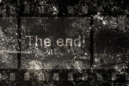The end  Cinefilm on the old brown paperの写真素材