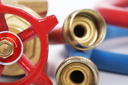 The tool of the plumber on a white background