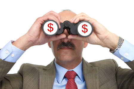 The businessman looks in the binoculars on a white backgroundの写真素材