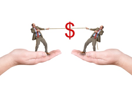 Two businessmen pull a cord, isolated over a white backgroundの写真素材