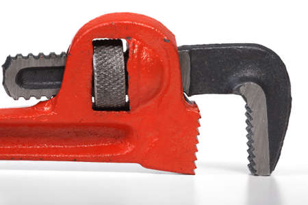 The metallic spanner on a white background