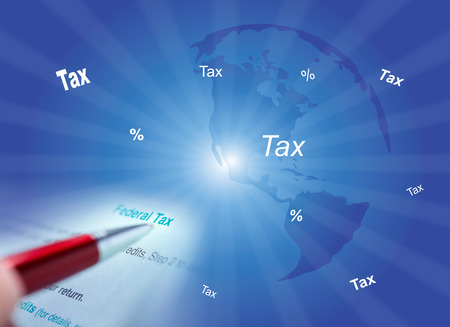 The successful businessman fill in tax returnの写真素材