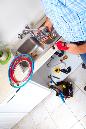 Plumbing tools on the kitchen. Renovation  background.の写真素材