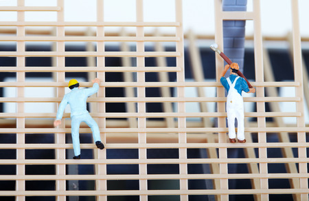 Construction of cottages. Isolated on the white background