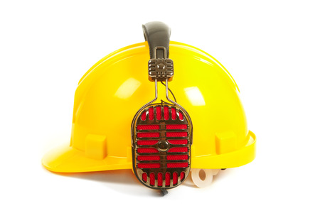 Helmet and headphones isolated on white background