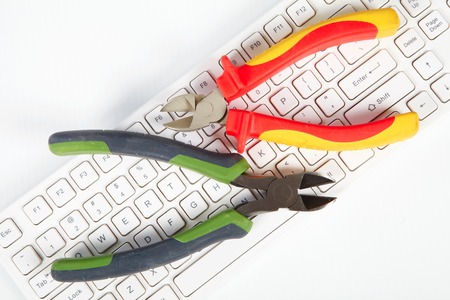 Construction and computer technology. Tools and keyboardの写真素材