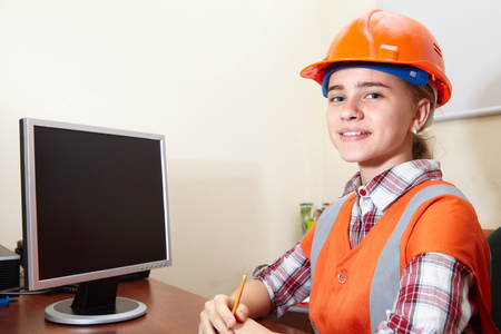 Young contractor relaxing in the office. Constructionの写真素材