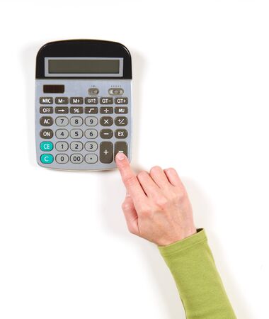 Hand in green jacket and grey calculator on white backgroundの写真素材