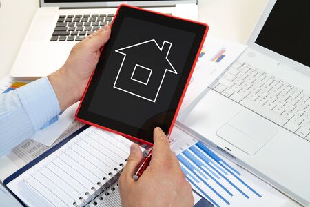 Businessman working with documents in the office. Cottageの写真素材