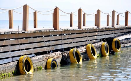 wooden pier into the seaの写真素材