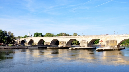 Bridge over the Danube River, Regensburg, Germanyの写真素材