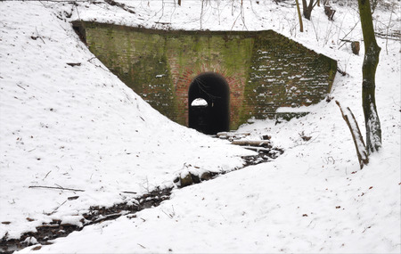 View of the old tunnel and a small stream in winter, Moravia, Czech Republic, Europeの写真素材